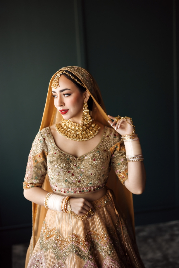 designer champagne gold lehenga blush pink accents bridal outfit USA